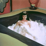 Bettie Page and a lot of bubbles