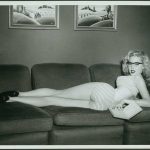 Betty Brosmer on the couch